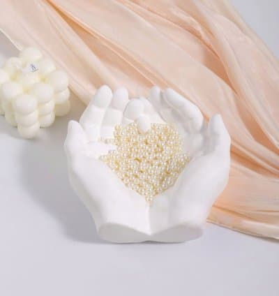 Vide poche doigt en plâtre